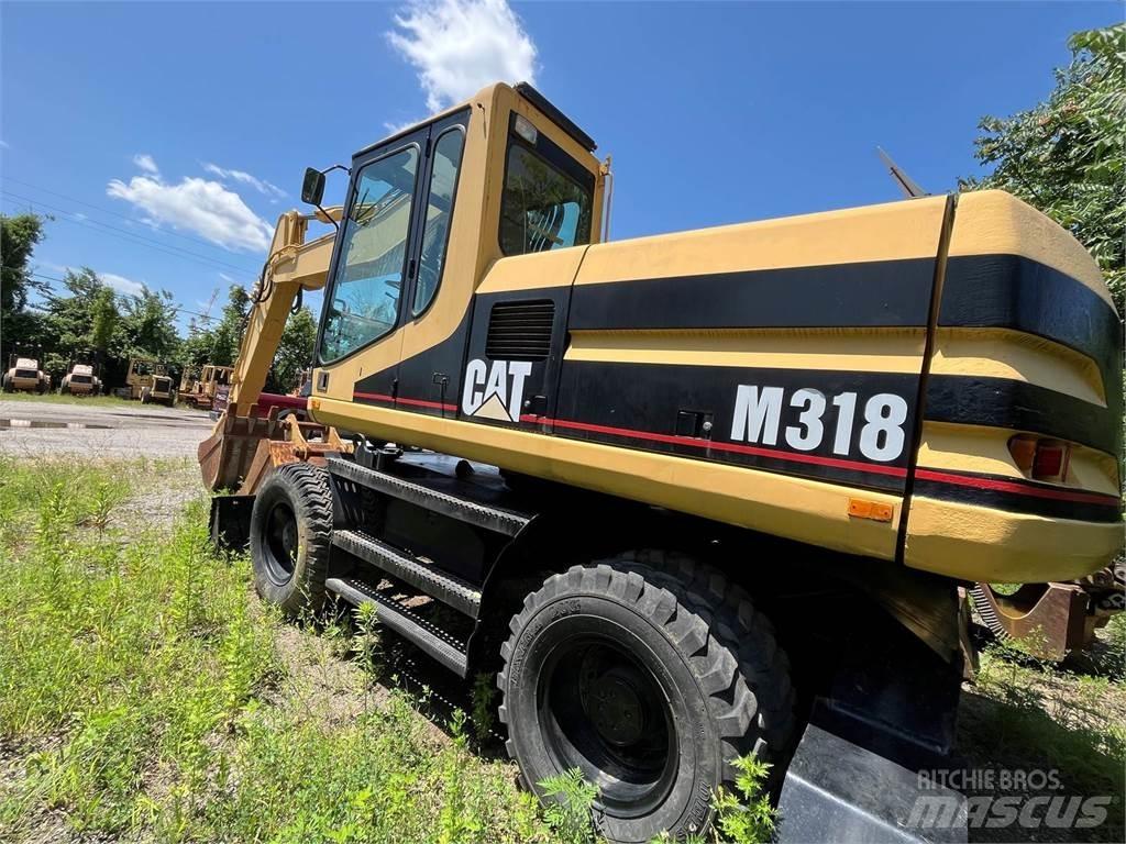 CAT M318 Ratiniai ekskavatoriai