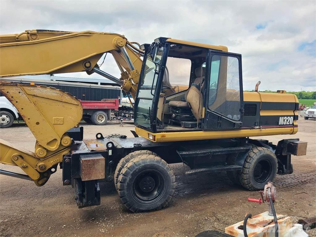 CAT M320 Ratiniai ekskavatoriai