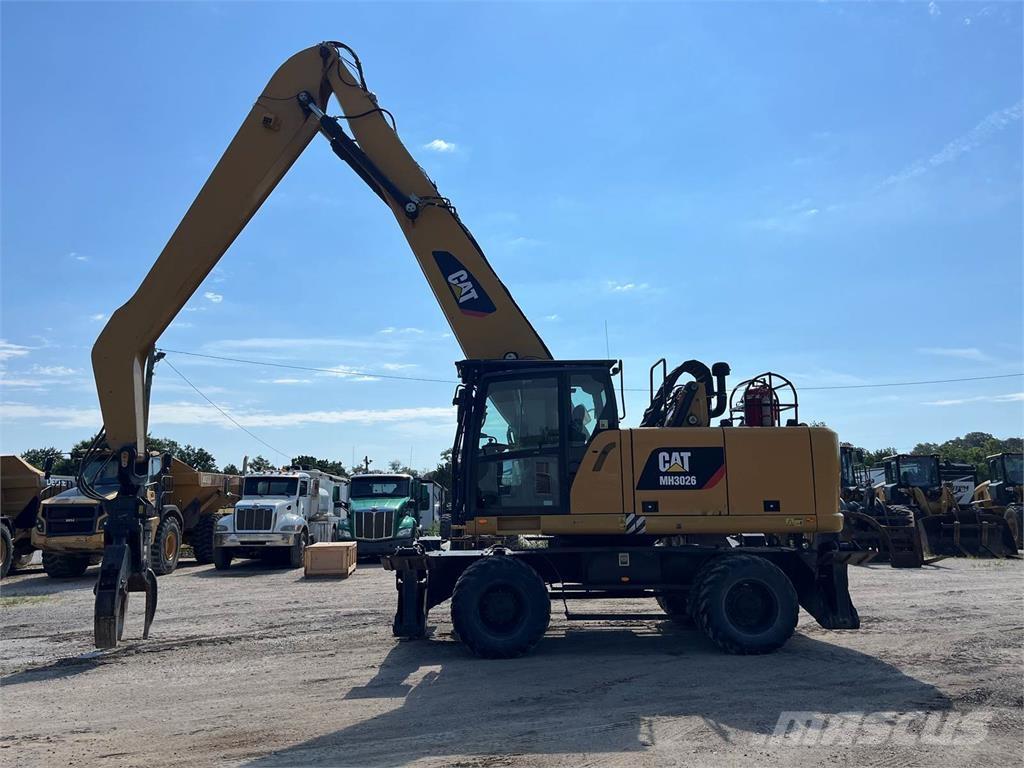CAT MH3026 Griovimo ekskavatoriai