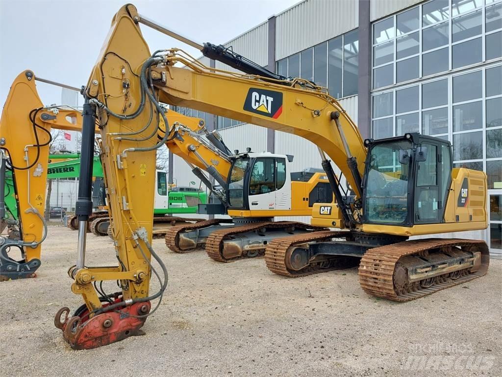 CAT 323 Vikšriniai ekskavatoriai