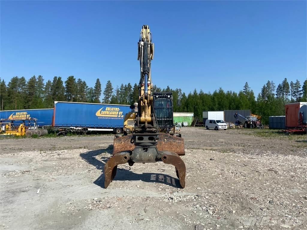 CAT M318D Krovimas/Kėlimas - Kita
