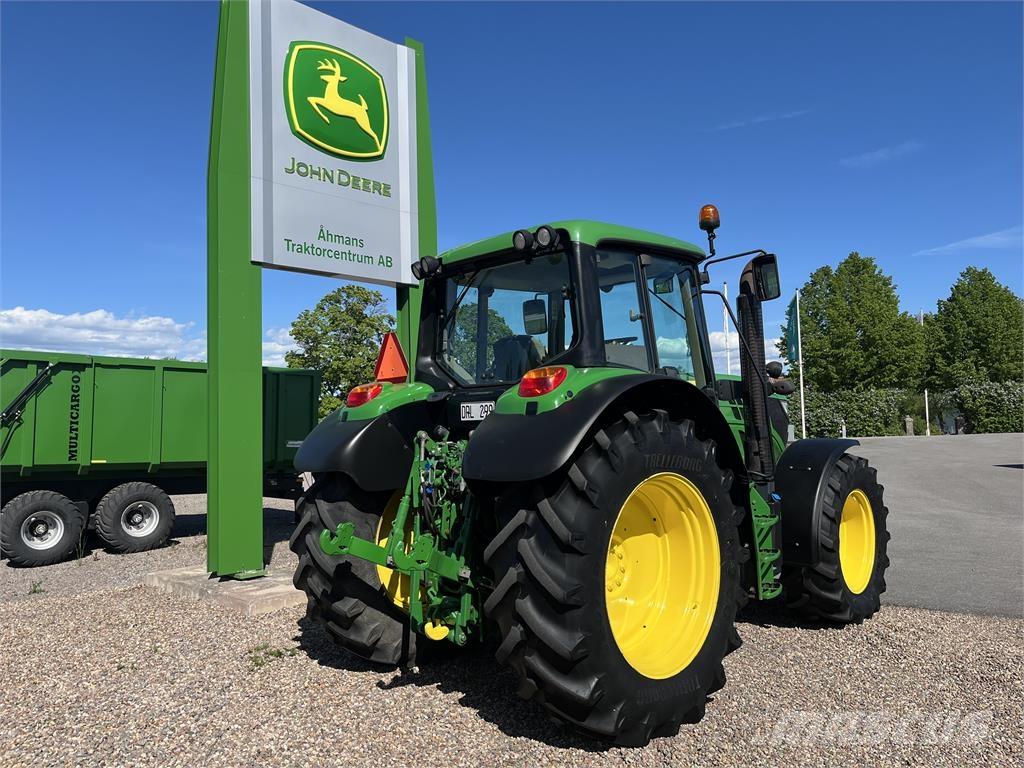 John Deere 6125M Traktoriai