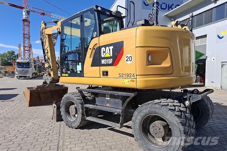 CAT M 315 F Ratiniai ekskavatoriai