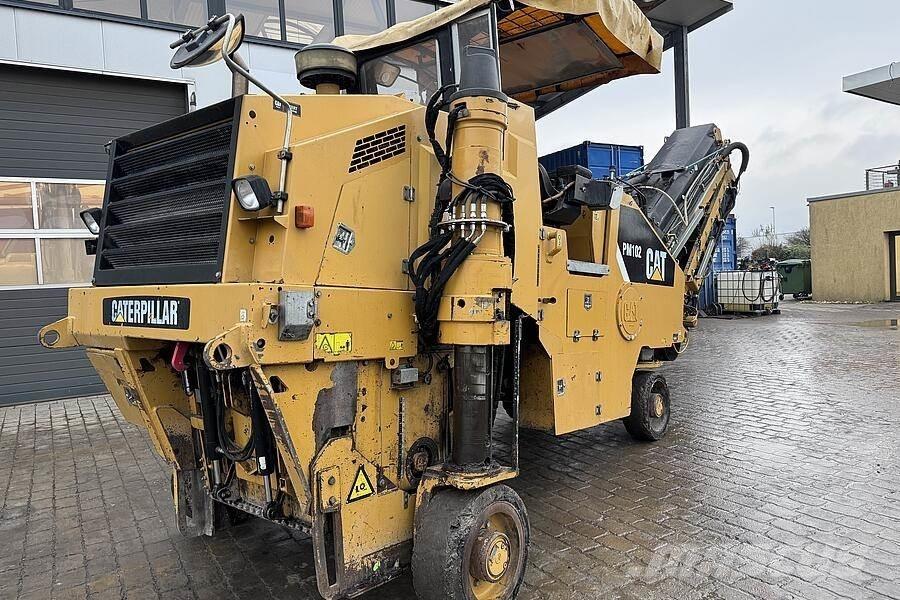 CAT PM 102 Asfalto šalto frezavimo technika