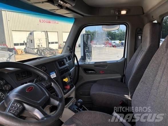 Peterbilt 567 Savivarčių priekabų vilkikai
