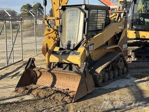 CAT 257B Statyba - Kita