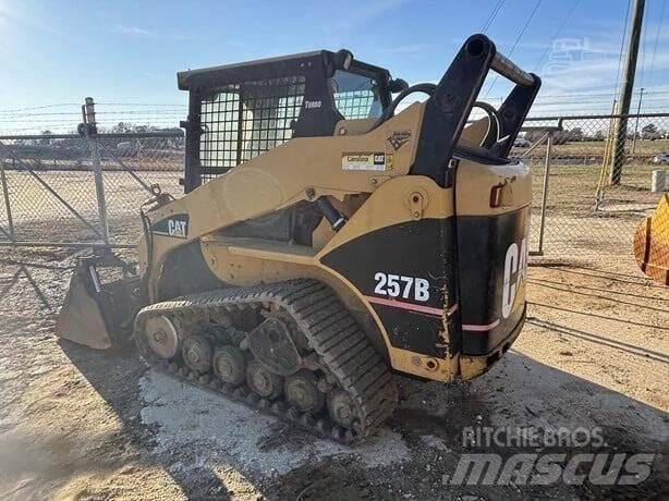 CAT 257B Statyba - Kita