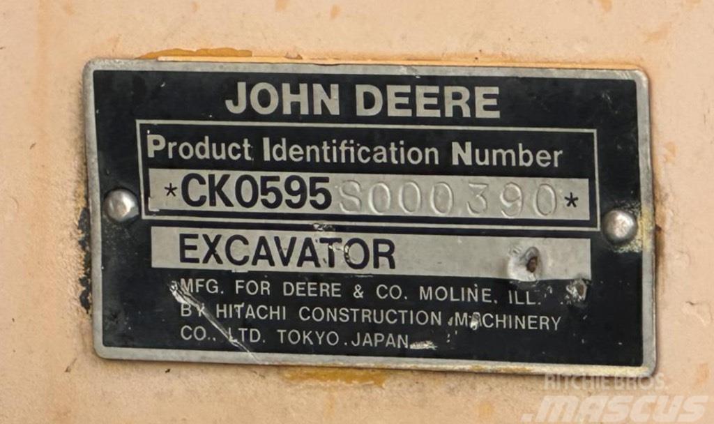 John Deere 595 Ratiniai ekskavatoriai