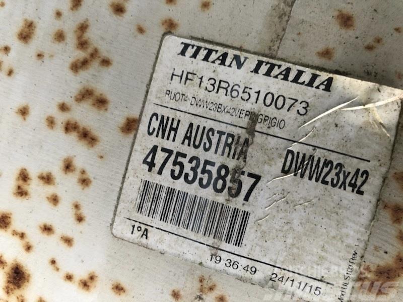 Titan 23x42 10 huls fra NH T7.315 Padangos, ratai ir ratlankiai