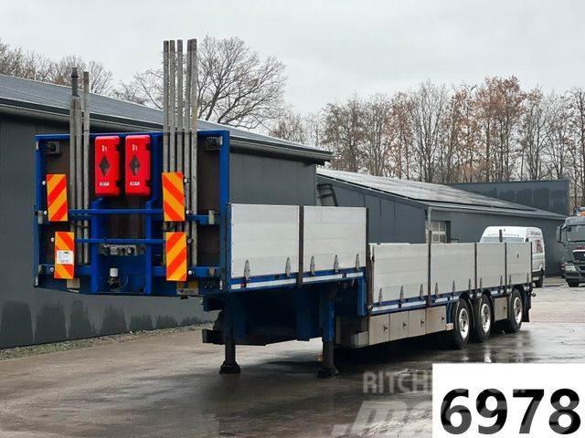 HRD STLB 3N Pritsche m. Tiefbett Rungen Lenkachse Bortinių sunkvežimių priekabos su nuleidžiamais bortais